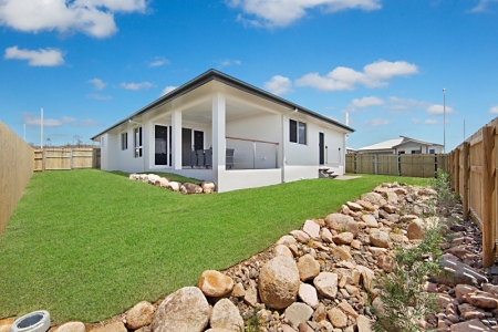Patio and spacious yard with side access